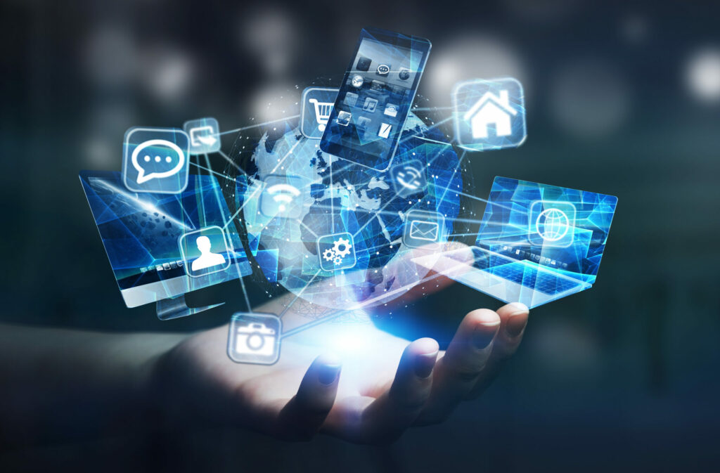 Tech devices and icons connected to digital planet earth e-Millennium e-Millennium